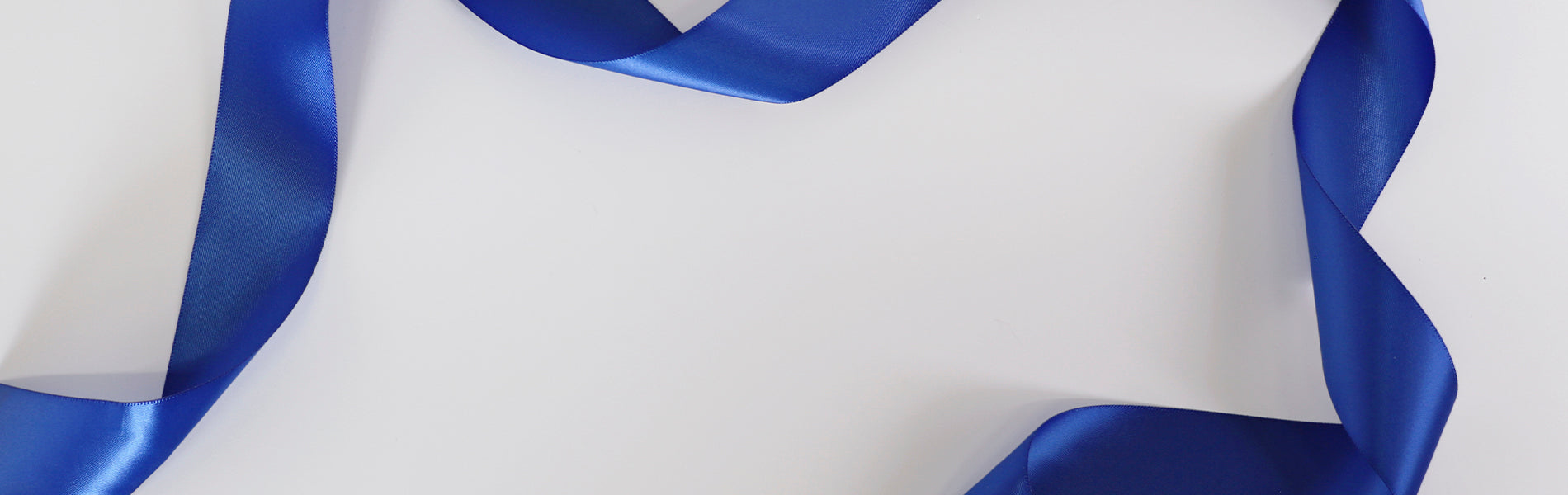 Grey background with a blue ribbon on it
