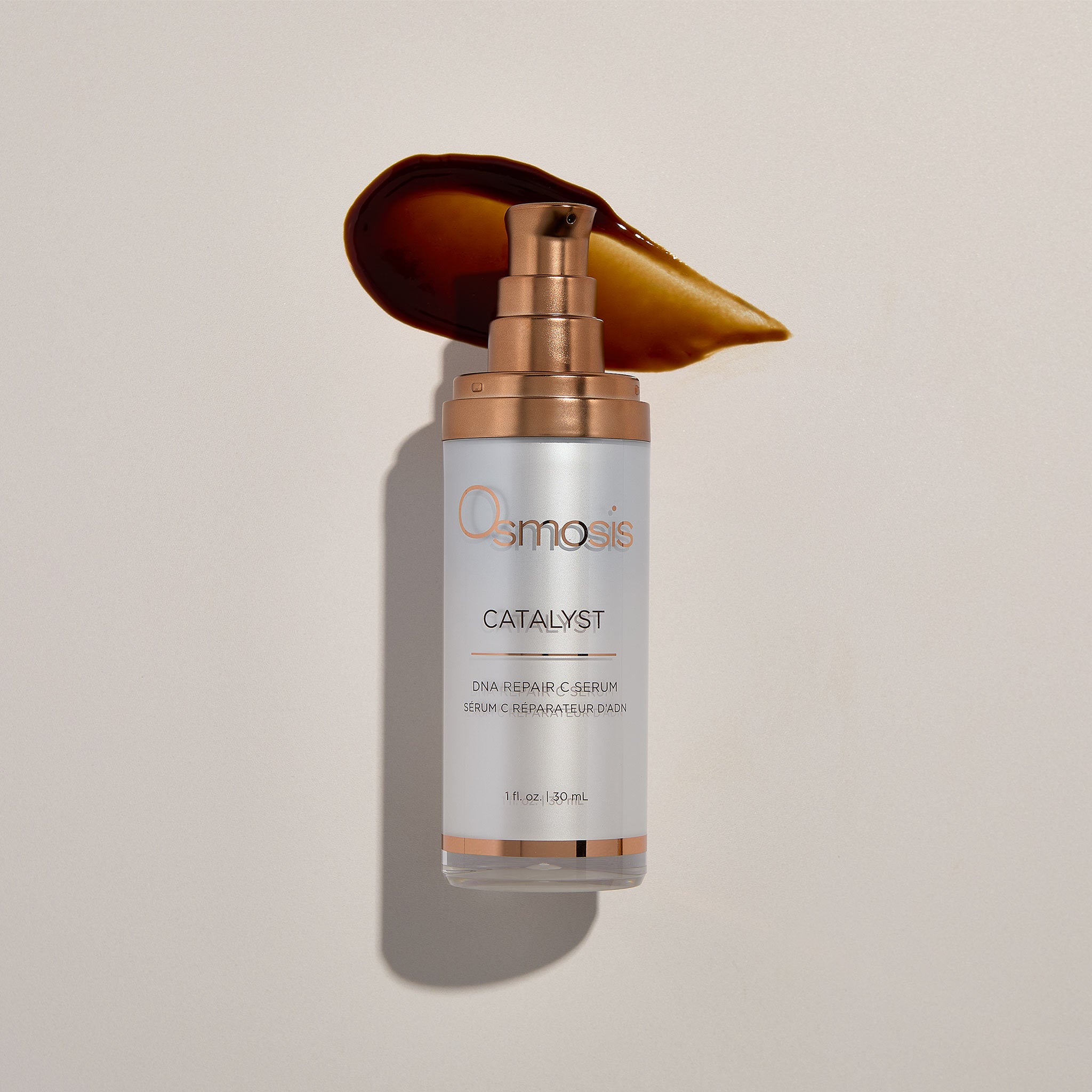 Osmosis Catalyst Serum with product swatch on a tan background