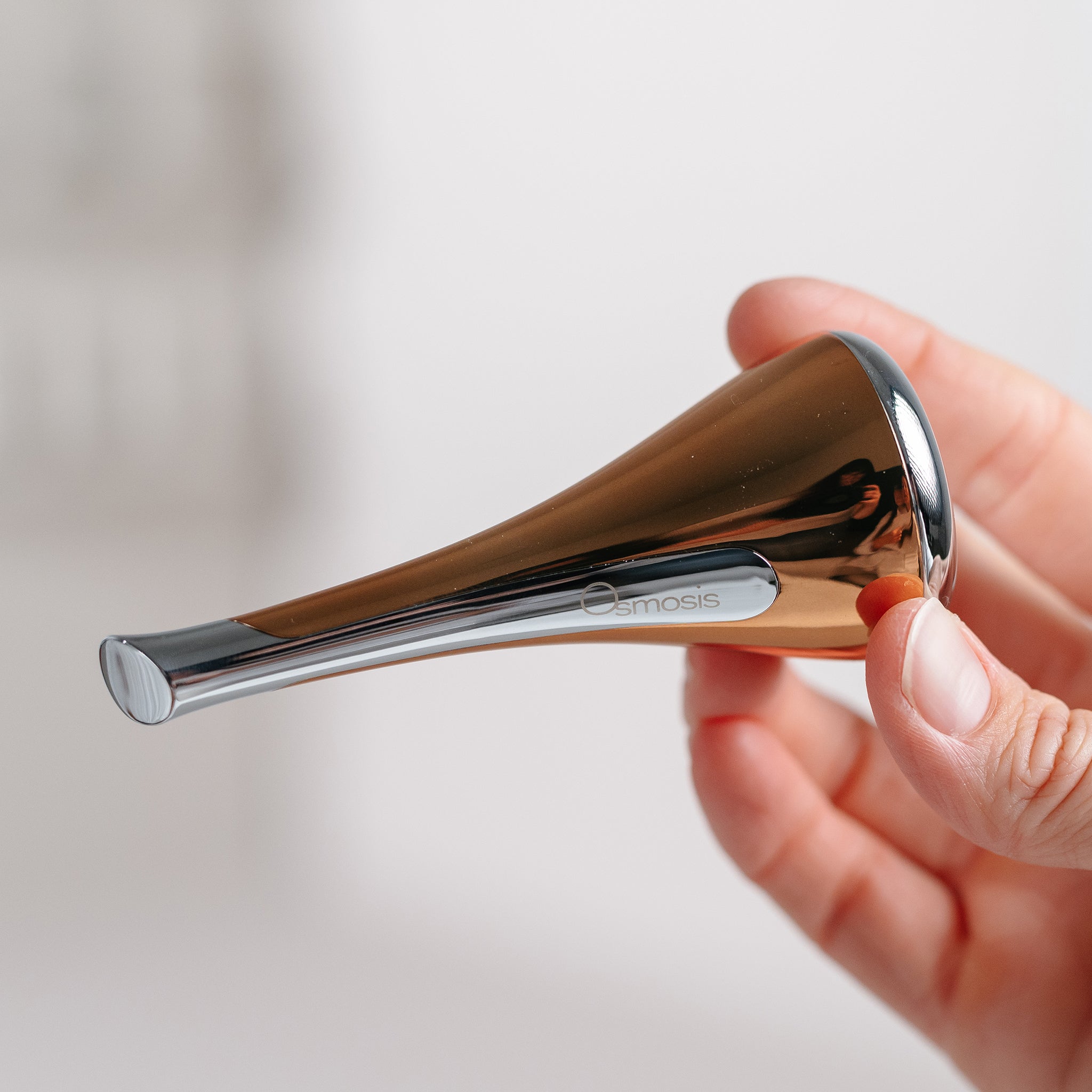 Osmosis Cool Tool in hand