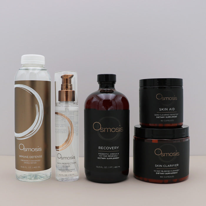 Collection of Osmosis skincare and supplement products on a neutral background