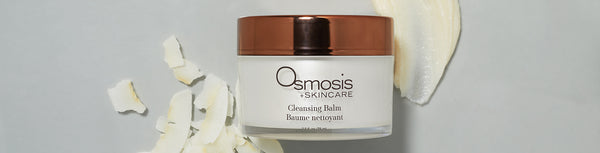 Osmosis Beauty Cleansing Balm on a grey background with white product behind.