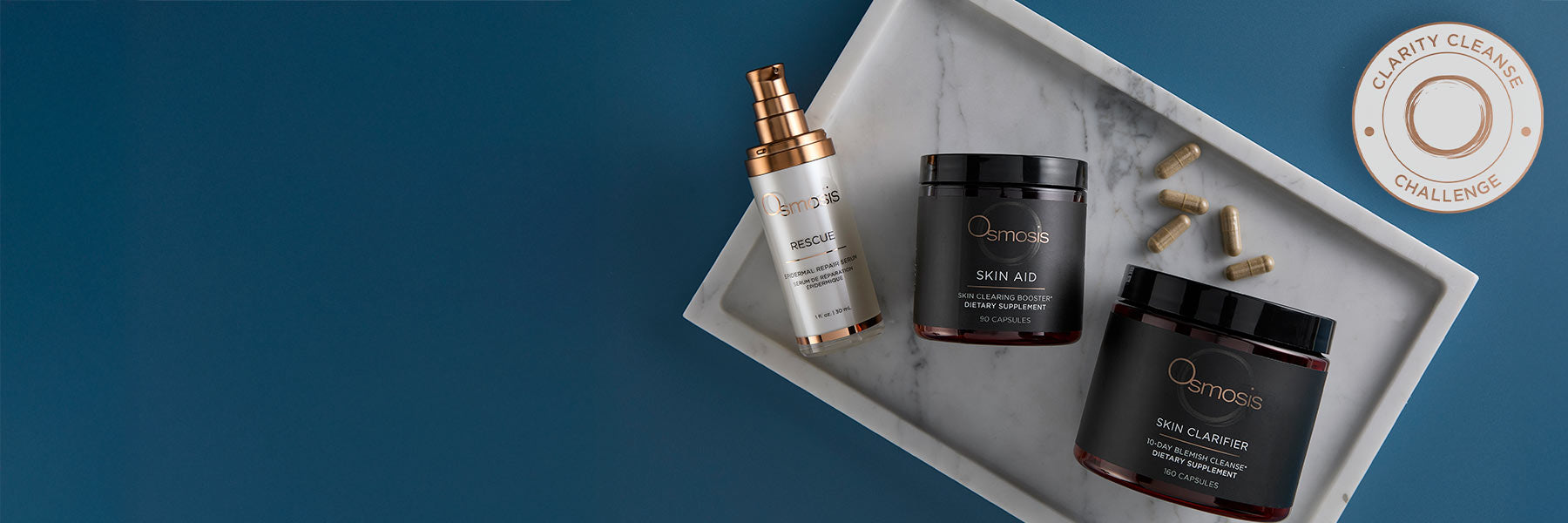 Osmosis Clarity Cleanse bundle on a marble tray with a sticker.
