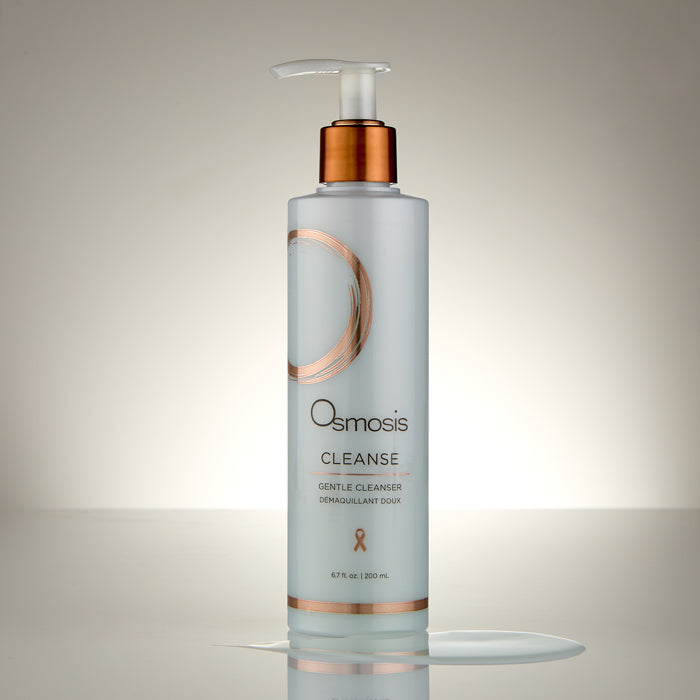 Osmosis Gentle Cleanser bottle with bronze cap on a gradient background