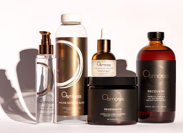 Collection of Osmosis wellness products on a white background