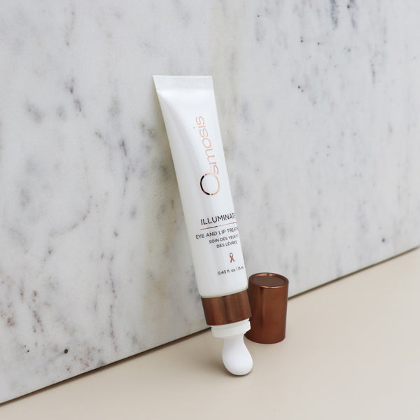 Osmosis Illuminate Eye and Lip Treatment against a marble background