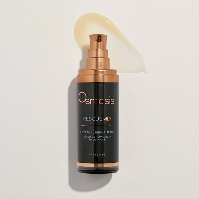 Osmosis Rescue MD serum bottle with a beige droplet on a light gray background