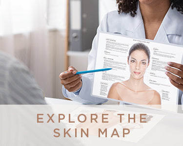 Explore the Skin Map Woman holding laminated version of the Skin Map and pointing to it with a blue pen