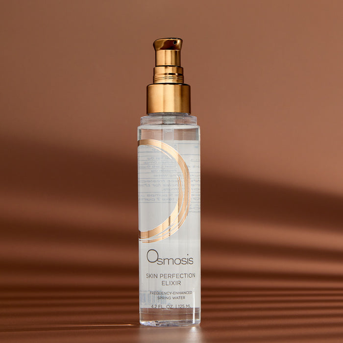Skin Perfection Elixir on copper background