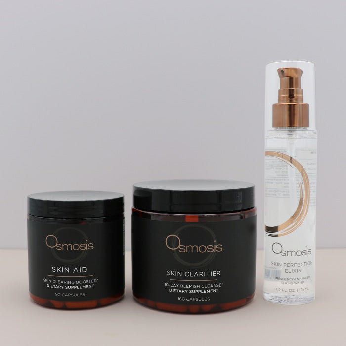 Osmosis Redness Bundle-Skin Clarifier Skin Aid and Skin Perfection Elixir on a grey background
