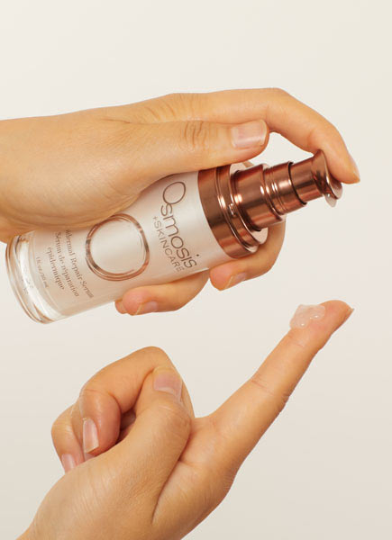 Osmosis Epidermal Repair Serum being pumped onto a finger